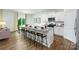 Modern kitchen with a large island, granite countertops, and stainless steel appliances at 3880 Maxwell Henry Nw Ln, Conover, NC 28613