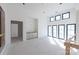 Bright bonus room with large windows and high ceilings at 986 Pinnacle Dr, Iron Station, NC 28080