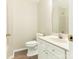 Clean bathroom featuring a vanity with storage, a toilet, and a shower at 1623 Forest Stream Ct, Charlotte, NC 28213