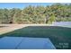 Spacious backyard with a lawn and a treeline at 4342 Allenby Pl, Monroe, NC 28110