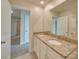 Bathroom with double vanity, granite countertops, a large mirror, and ample storage space at 4342 Allenby Pl, Monroe, NC 28110