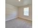 Well-lit bedroom with neutral carpet, a window, and a calming atmosphere at 4342 Allenby Pl, Monroe, NC 28110