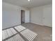 Spacious bedroom with neutral carpet, and two doors providing easy access throughout the home at 4342 Allenby Pl, Monroe, NC 28110