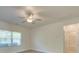 A bright bedroom featuring neutral walls, carpet flooring, and a fan at 4342 Allenby Pl, Monroe, NC 28110