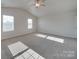 A large bedroom featuring carpet flooring and neutral walls at 4342 Allenby Pl, Monroe, NC 28110