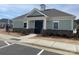 A beautifully designed community clubhouse with a welcoming entrance and lush landscaping at 4342 Allenby Pl, Monroe, NC 28110