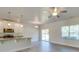 Bright, open kitchen features granite countertops, stainless steel appliances, and hardwood floors at 4342 Allenby Pl, Monroe, NC 28110