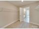 Spacious walk-in closet with carpet and built-in shelving at 4342 Allenby Pl, Monroe, NC 28110