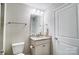 Small bathroom with toilet and granite vanity at 7041 Barnstone Ct, Denver, NC 28037