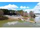 Community boat ramp with parking and a pier on a calm lake at 7041 Barnstone Ct, Denver, NC 28037