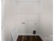 Functional laundry room with shelving and hookups at 8603 Mcclure Cir, Charlotte, NC 28216