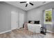 Comfortable bedroom with natural light, a bed, and ample closet space at 271 Lockhard Cir, Troutman, NC 28166