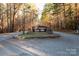 Entrance to Lake Norman State Park with stone sign surrounded by trees at 271 Lockhard Cir, Troutman, NC 28166