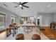 Spacious living room with hardwood floors, stylish furniture, and natural light, showcasing a comfortable living space at 271 Lockhard Cir, Troutman, NC 28166