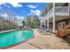 Backyard pool with lounge chairs, a large deck, and a view of the house at 271 Lockhard Cir, Troutman, NC 28166