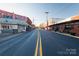 Charming street view featuring old buildings, businesses, and a clear blue sky on a sunny day at 271 Lockhard Cir, Troutman, NC 28166