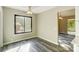 Eat in kitchen offers natural light, hardwood floors, and convenient access to adjacent dining area at 11429 Spreading Oak Ln, Charlotte, NC 28226