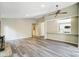 Spacious living area with an open view to the kitchen and modern wood flooring at 11429 Spreading Oak Ln, Charlotte, NC 28226