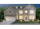 Two-story home with light brown siding, white accents, and landscaping at 117 Jentri Way, Mooresville, NC 28115