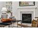 Modern fireplace with marble surround and built-ins at 117 Jentri Way, Mooresville, NC 28115