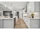 Bright kitchen featuring white cabinetry, stainless steel appliances, and an island at 117 Jentri Way, Mooresville, NC 28115