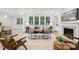 Living room featuring a modern fireplace and large windows at 117 Jentri Way, Mooresville, NC 28115