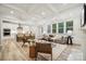 Open living space with coffered ceilings and fireplace at 117 Jentri Way, Mooresville, NC 28115