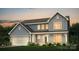 Two-story house with gray siding, white trim, and a double-car garage at 121 Jentri Way, Mooresville, NC 28115