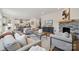 Open concept living area with fireplace, hardwood floors and kitchen views at 121 Jentri Way, Mooresville, NC 28115
