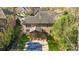 Expansive backyard with a covered patio, screened porch, and a swimming pool (covered) at 5303 Shasta Hill Ct, Charlotte, NC 28211