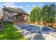 Scenic backyard with a screened-in porch, an in-ground pool, and a lush lawn at 5303 Shasta Hill Ct, Charlotte, NC 28211