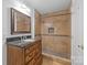 Bathroom showcasing a step-in shower, granite countertop, and wood vanity at 5303 Shasta Hill Ct, Charlotte, NC 28211