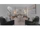 Stylish living room with hardwood floors, archway to the hall, and lots of natural light at 5303 Shasta Hill Ct, Charlotte, NC 28211