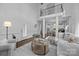 Bright living room features a second story balcony, open floor plan and neutral furnishings at 5303 Shasta Hill Ct, Charlotte, NC 28211