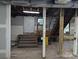 Unfinished basement featuring support beams and visible ceiling at 602 W Council St, Salisbury, NC 28144