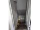 Stairway leading to unfinished basement with wooden steps at 602 W Council St, Salisbury, NC 28144