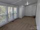 Bright room with carpet, white walls, and plenty of natural light from multiple windows at 602 W Council St, Salisbury, NC 28144