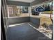 Covered front porch offering a cozy outdoor space with neighborhood views at 602 W Council St, Salisbury, NC 28144