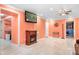 Bright Gathering room with fireplace and access to other rooms at 112 Sugar Thyme Ln, Mooresville, NC 28115