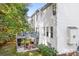 White two-story house with deck overlooking backyard at 112 Sugar Thyme Ln, Mooresville, NC 28115