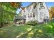 Two-story house with deck and landscaped yard at 112 Sugar Thyme Ln, Mooresville, NC 28115