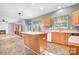 Open kitchen with island and views into Gathering room at 112 Sugar Thyme Ln, Mooresville, NC 28115