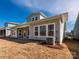 Exterior of home featuring spacious backyard and covered patio at 1200 Meander Ln, Waxhaw, NC 28173