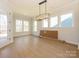 Dining area features hardwood floors, recessed lights and multiple windows at 1200 Meander Ln, Waxhaw, NC 28173