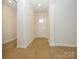 Bright entryway with light hardwood floors leading to the home's interior at 1200 Meander Ln, Waxhaw, NC 28173