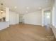 Open floor plan showcases hardwood floors and smooth transition between living spaces at 1200 Meander Ln, Waxhaw, NC 28173