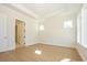 Large bedroom with tray ceiling, hardwood floors and recessed lights at 1200 Meander Ln, Waxhaw, NC 28173