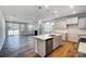 Spacious kitchen with stainless steel appliances that opens to the living room at 2608 Tillman St, Monroe, NC 28112