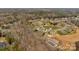 Aerial view of neighborhood with houses and trees at 2714 Stonewood Vw, Kannapolis, NC 28081