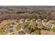 Aerial view of neighborhood with houses and trees at 2714 Stonewood Vw, Kannapolis, NC 28081